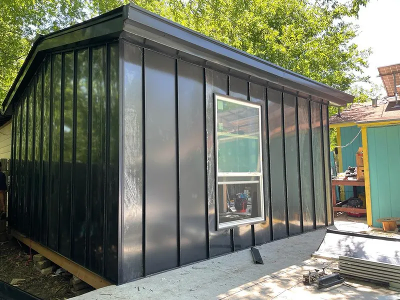 Black standing seam metal wall panels for Metal Roof Installation in Dock Junction